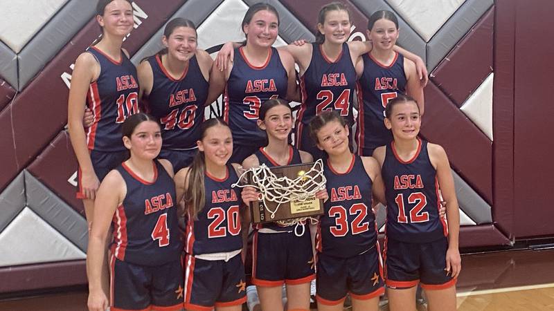 Carlo Acutis seventh grade girls basketball wins regional title