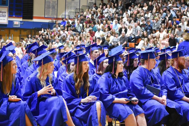 Graduates and their families listen to speakers during the commencement ceremony Saturday, May 20, 2023, at Genoa-Kingston High School.