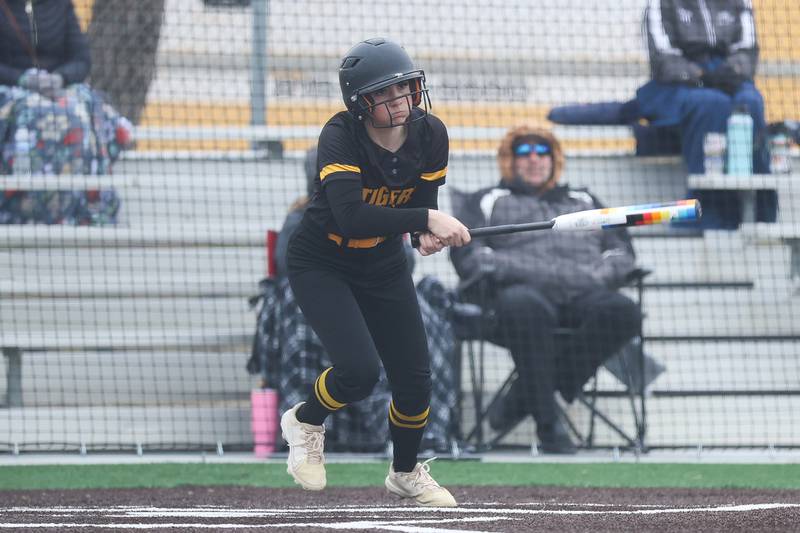 Joliet West’s Mallory Crisafolli eyes a drive down first base line against Sandburg on Thursday, March 12, 2026 in Joliet.