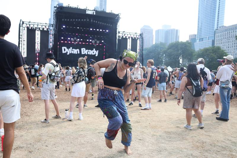 Rae Forman, from Chicago, dances to the beats of Dylan Brady at Lollapalooza on Saturday, Aug. 3, 2024 in Chicago.