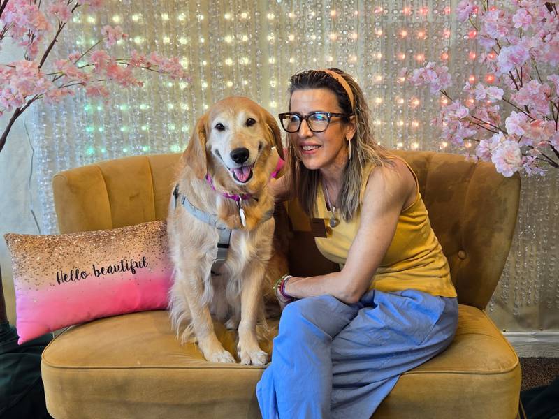 Denise Samuel, of Campton Hills, and her foster dog, Nutmeg, 6, a rescue from As Good As Gold -Golden Retriever Rescue of Illinois.
