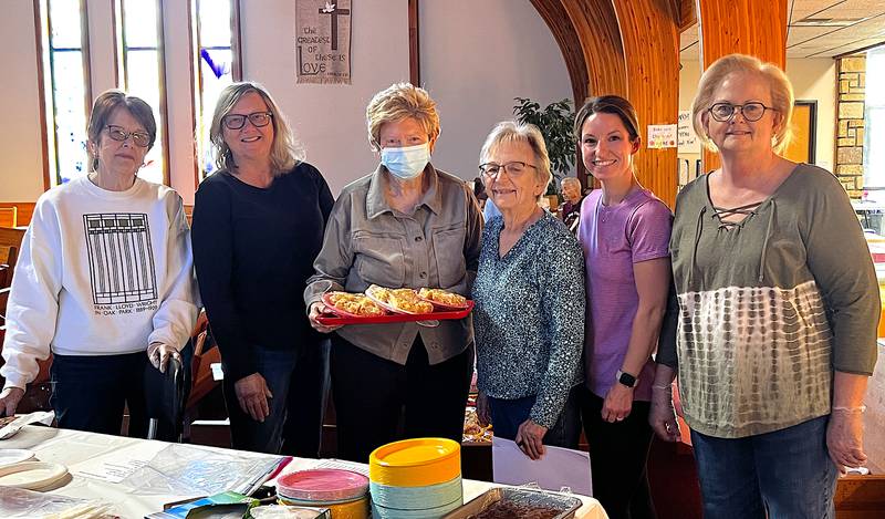 Yorkville Congregational United Church of Christ members preparing for the bake sale that is part of the spring rummage sale at the churc. (From left)Peg Knell, Abby Rhodes, Sandy Lindblom, Linda Melhouse, Lindsay Martinez and Salli Walden. Home baked goods will be for sale on Friday, April 11 as long as supplies last.