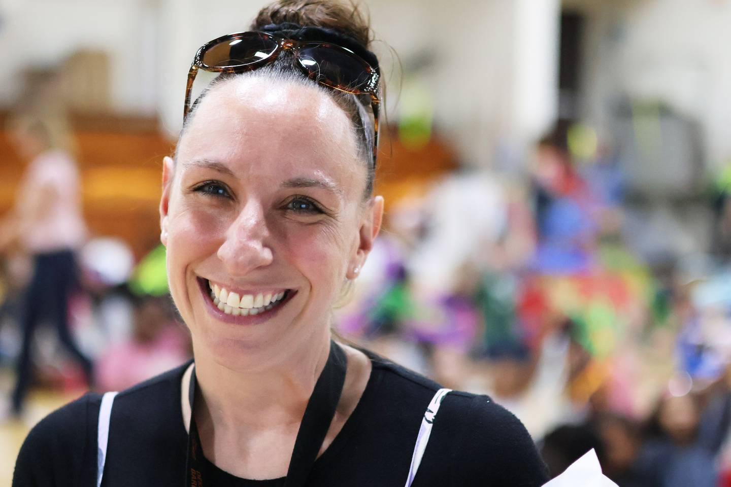 Ashley Carlson, fifth grade teacher at Malta Elementary School in DeKalb, reacts as she's announced as the 2026 Wirtz Award winner for excellence in education during a surprise school assembly on April 24, 2026.