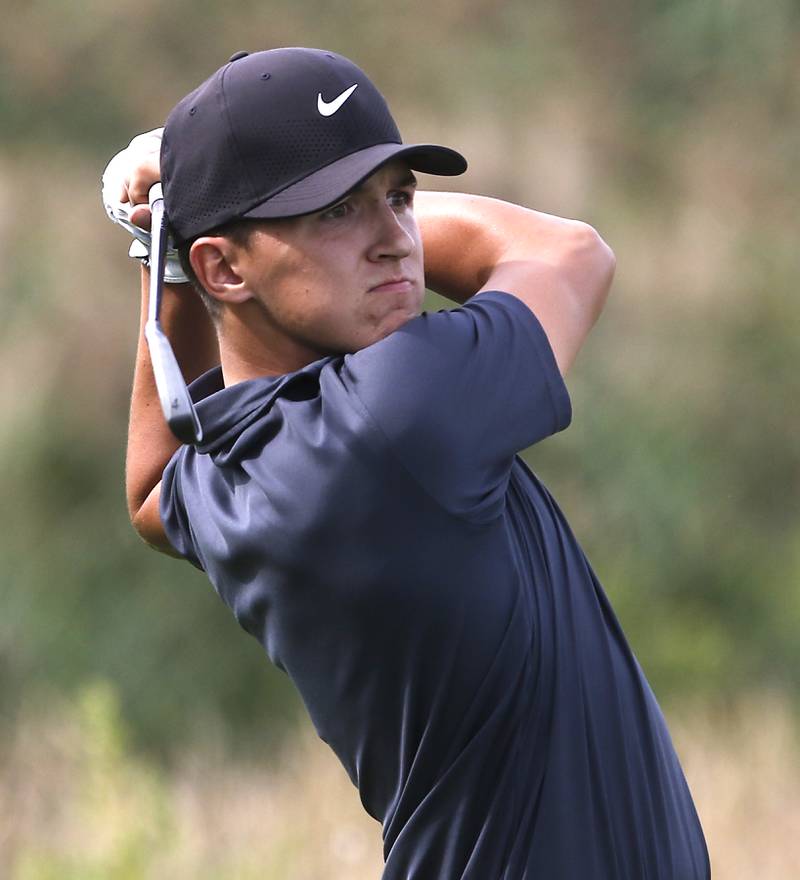 Sycamore’s Andrew Swedberg watches his tee shot on the seventh hole during the IHSA Class 2A Crystal Lake South Boys Golf Regional on Wednesday, Oct. 1, 2025 at RedTail Golf Club in Lakewood.