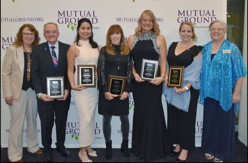 Pictured from left are Mutual Ground CEO Linda Maranda, Representative Matt Hanson, Representative Barbara Hernandez, Senator Linda Holmes, Representative Stephanie Kifowit, Representative Maura Hirschauer and Mutual Ground Board President Anne Barrett.