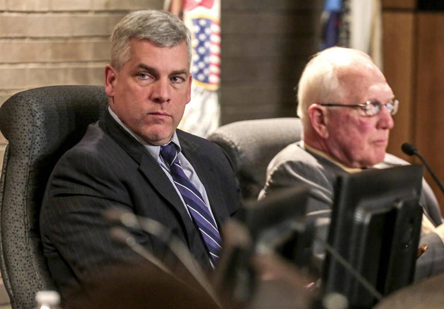 Joliet Mayor Bob O'Dekirk (left) and Councilman Pat Mudron, adversaries in disputes going back to  May 2019 over the city manager job, seen at a City Council meeting.
