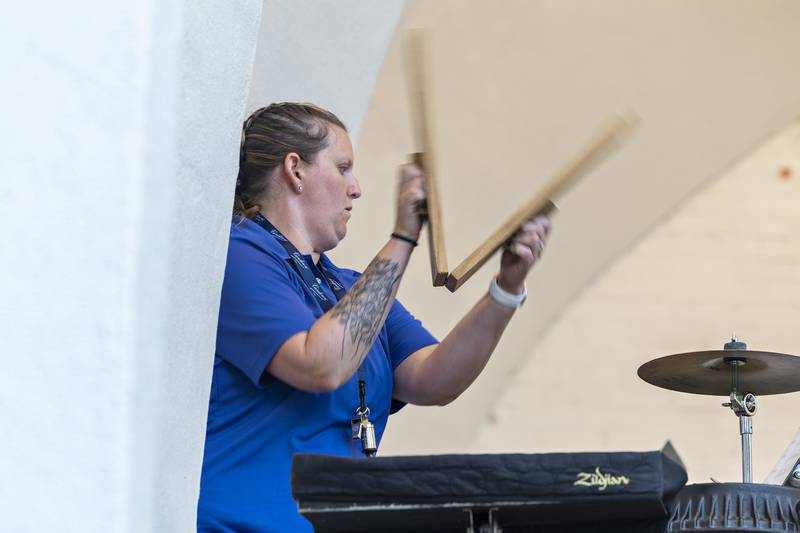 A percussionist for the Sterling Municipal Band plays a sound effect Wednesday, July 16, 2025, during the band’s rendition of “Animation (Episode 1: Wabbit!).” The song takes the listener down a classic cartoon path.