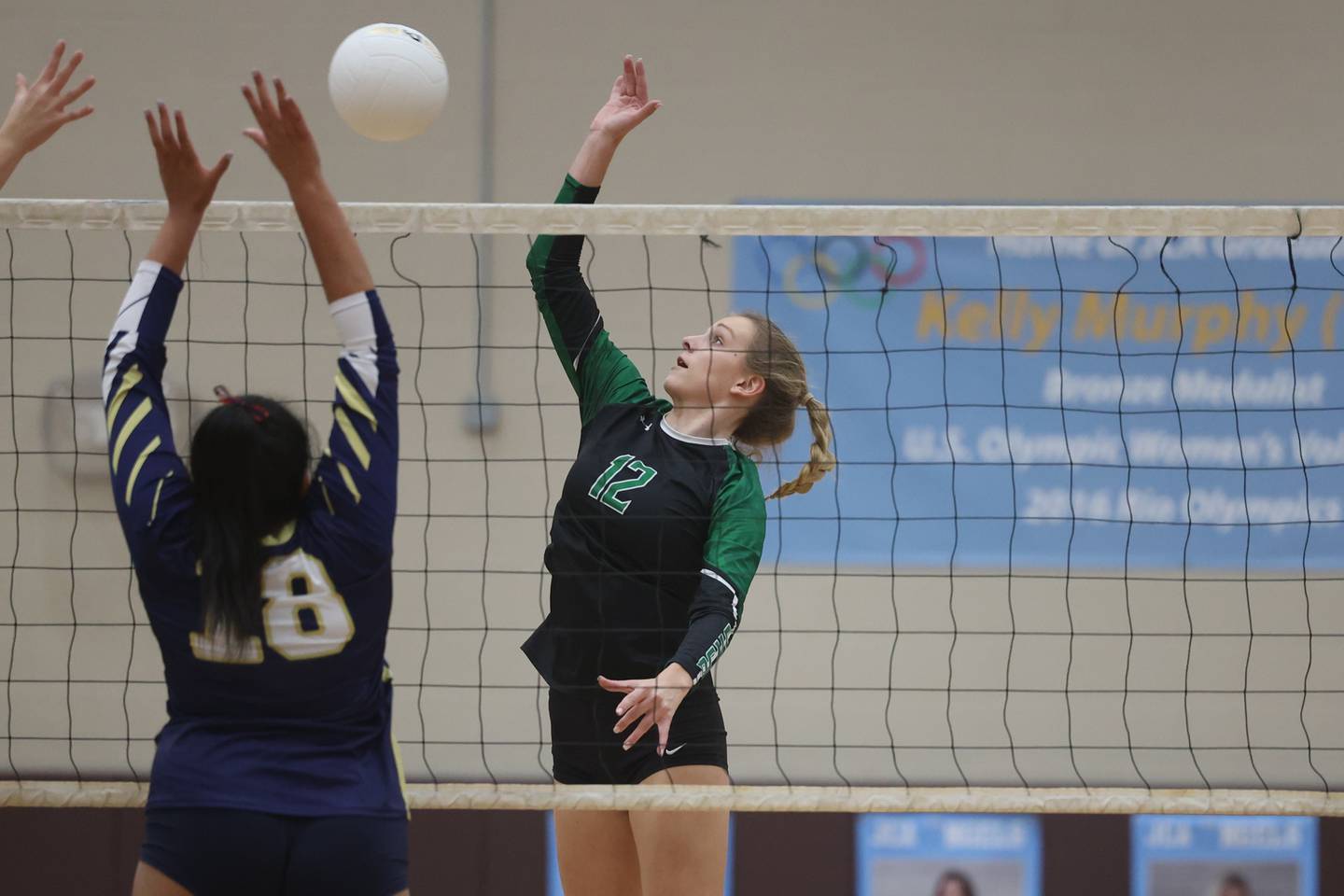 Providence’s Patyon Mandac hits a shot against Lemont in the Class 3A Providence Sectional semifinal on Monday.