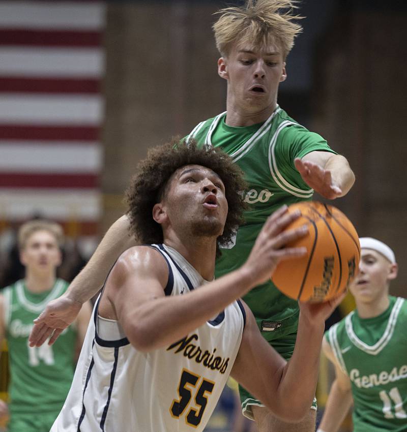 Sterling’s AJ Coleman looks to put a shot up against  Geneseo’s Kellen VanKerrebroeck Friday, Dec. 5, 2025.