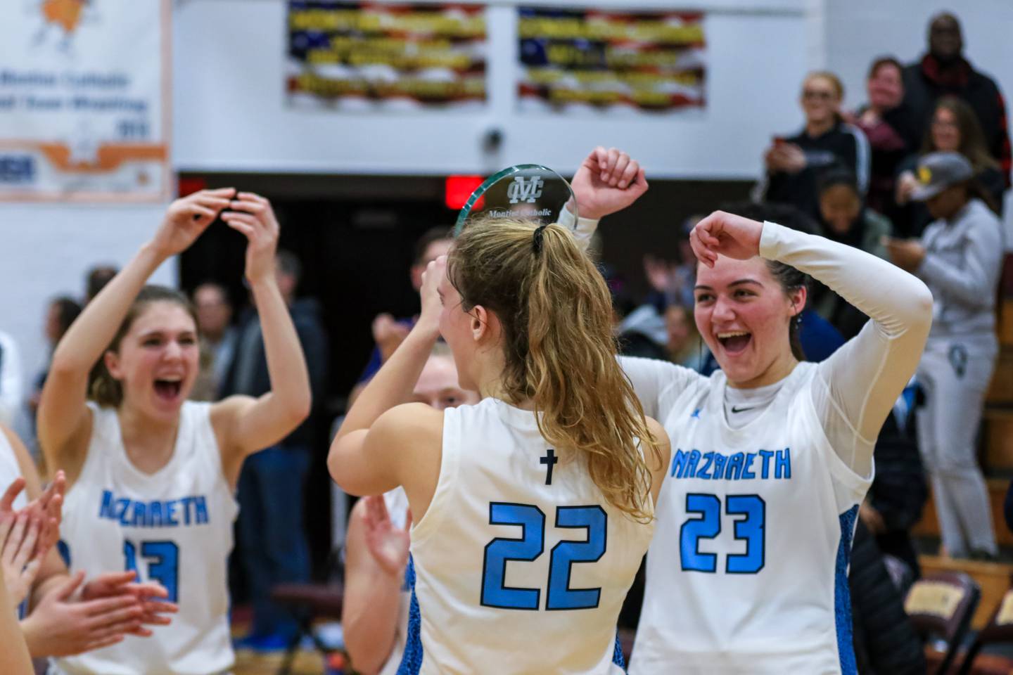 Nazareth celebrates winning the Montini Christmas Classic, championship basketball game over Whitney Young.  Dec 30, 2022.