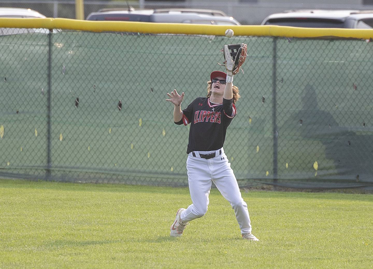 Amboy’s Ryan Dickinson hauls in a fly ball against Newman Thursday, May 18, 2023.