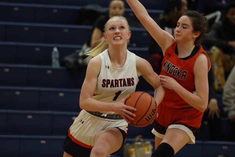 Romeoville’s Emily Gabrelcik drives to the basket against Minooka on Tuesday January 24th, 2023.