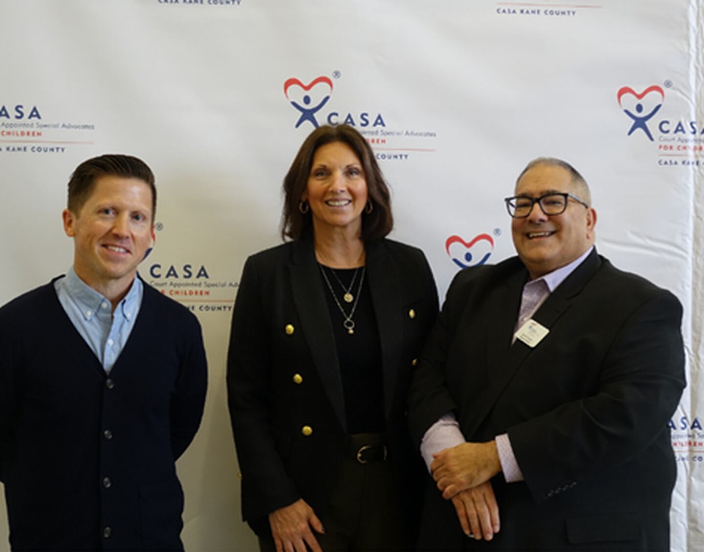 (From left): Josh Shipp, CASA Board Chair Kris Wano and CASA Executive Director Jim Di Ciaula stand together at CASA Kane County's 12th annual Superheroes Luncheon on Wednesday, Nov. 6, 2024, at Waubonsee Community College.