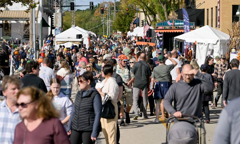 Riverside Avenue is packed with visitors to the Activity Zone of the annual Scarecrow Festival in St. Charles on Saturday, Oct 11, 2025.