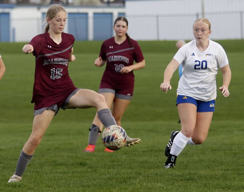 Marengo's Sophie Hanson intercepts a pass to Johnsburg’s Kayla Hillerduring a Kishwaukee River Conference soccer match on Wednesday, April 15, 2026, at Marengo High School.