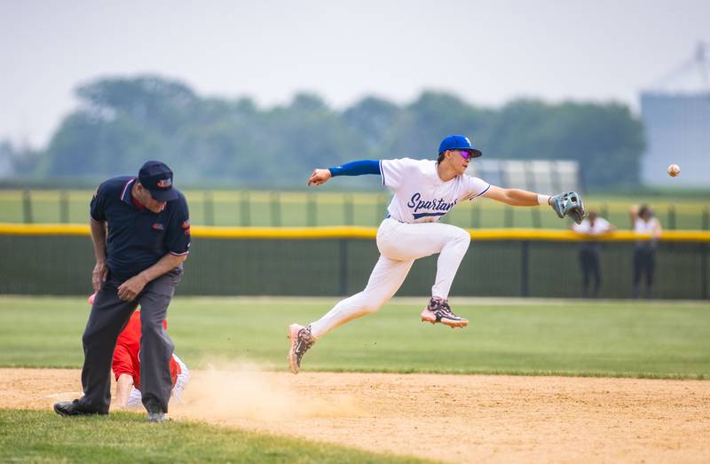 St. Francis High School’s Zack Maduzia misses a pickoff attempt during the Class 3A Kaneland Sectional final against Benet Academy at Kaneland High School in Maple Park on Saturday, June 7, 2025.
