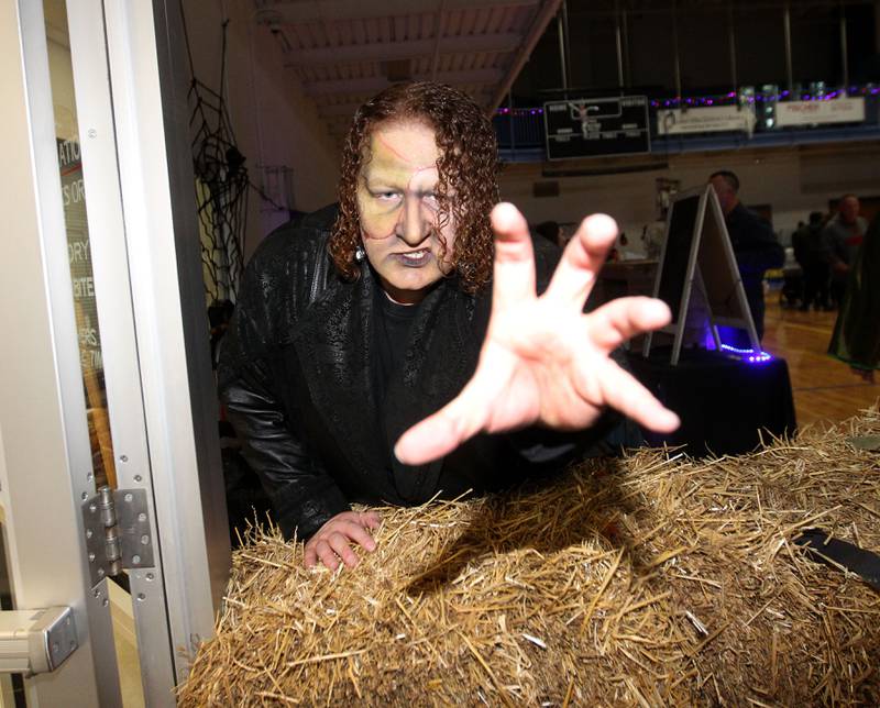 Jack Myers, 23, of Fox Lake, dressed as Frankenstein's monster, scares visitors during Witchy Thrills & Chills at the Lindenhurst Park District Lippert Community Center on October 14th in Lindenhurst.
Photo by Candace H. Johnson for Shaw Local News Network