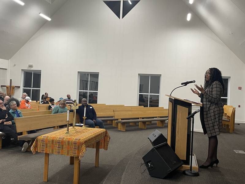Quiana Jones (right) speaks Nov. 6, 2023 at the DeKalb County Community Mental Health Board Town Hall meeting held at New Hope Missionary Baptist Church in DeKalb.