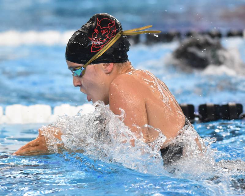 Hinsdale Central’s Caroline Kramer swims breaststroke in the 200-yard medley relay during the IHSA girls state swimming finals at FMC Natatorium in Westmont on Saturday, Nov. 12, 2022.