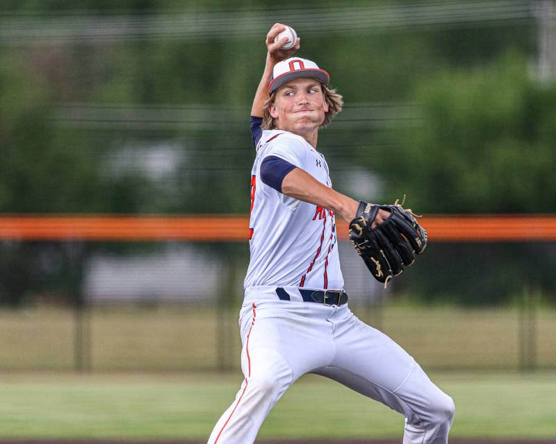 Oswego's Noah Mottet (32) delivers a pitch during Class 4A Romeoville Sectional semifinal game between Plainfield North at Oswego.  June 1, 2023.