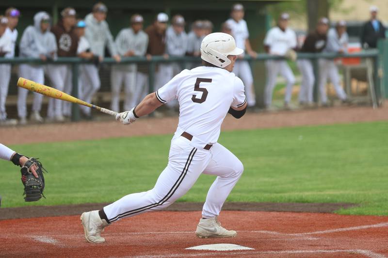 Joliet Catholic’s Derrick Pomatto singles against Nazareth on Wednesday, April 29, 2026 in Joliet.