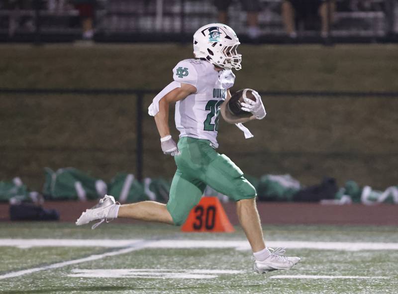 York's Henry Duda (26) runs the ball for a touchdown during the varsity football game between York and Hinsdale Central on Friday, Oct. 3, 2025 in Hinsdale, IL.