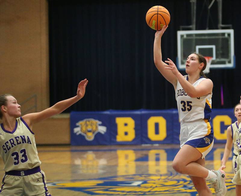 Somonauk/Leland's Kennedy Barshinger lets go of a shot over Serena's Jenna Setchell on Monday, Feb. 10, 2025 at Somonauk High School.