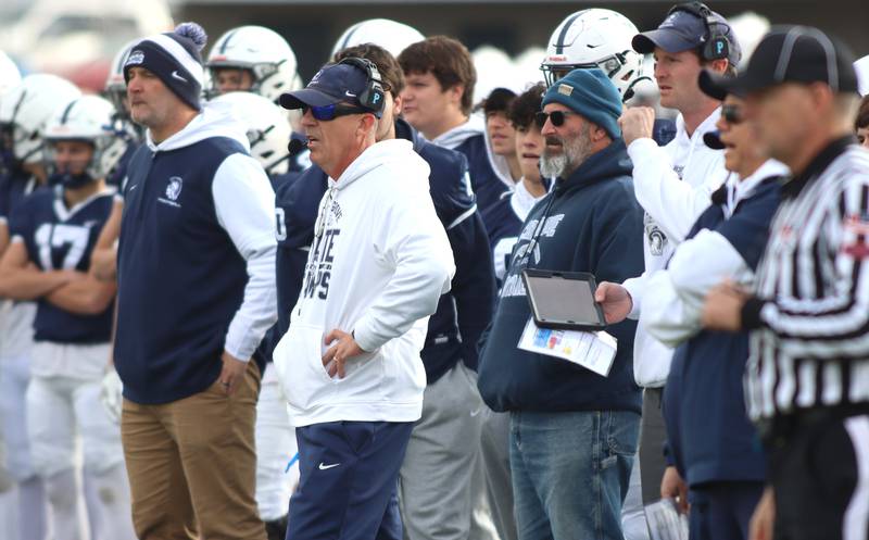 Cary-Grove’s head Coach Brad Seaburg and his staff  guide the Trojans against Belvidere North in IHSA Class 6A quarterfinal playoff football action on Saturday, Nov. 16, 2024, at Al Bohrer Field on the campus of Cary-Grove High School in Cary.
