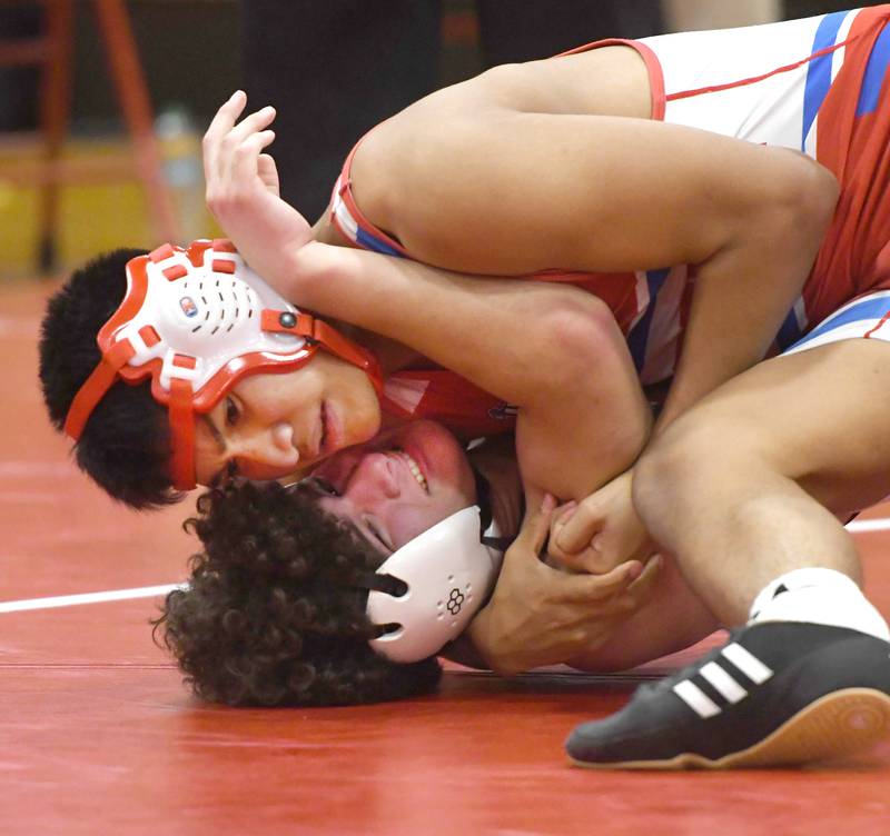 Oregon's Ian Tajibay wraps up Amboy's Sammy Navejos at 150 pounds on Tuesday, Nov. 25, 2025 at Oregon High School.