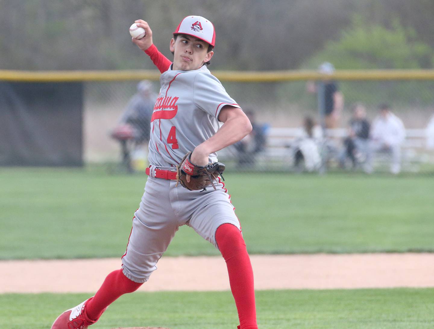 Ottawa's Camden Loomis delivers a pitch to a La Salle-Peru batter in a game last season at Dickinson Field in Oglesby.