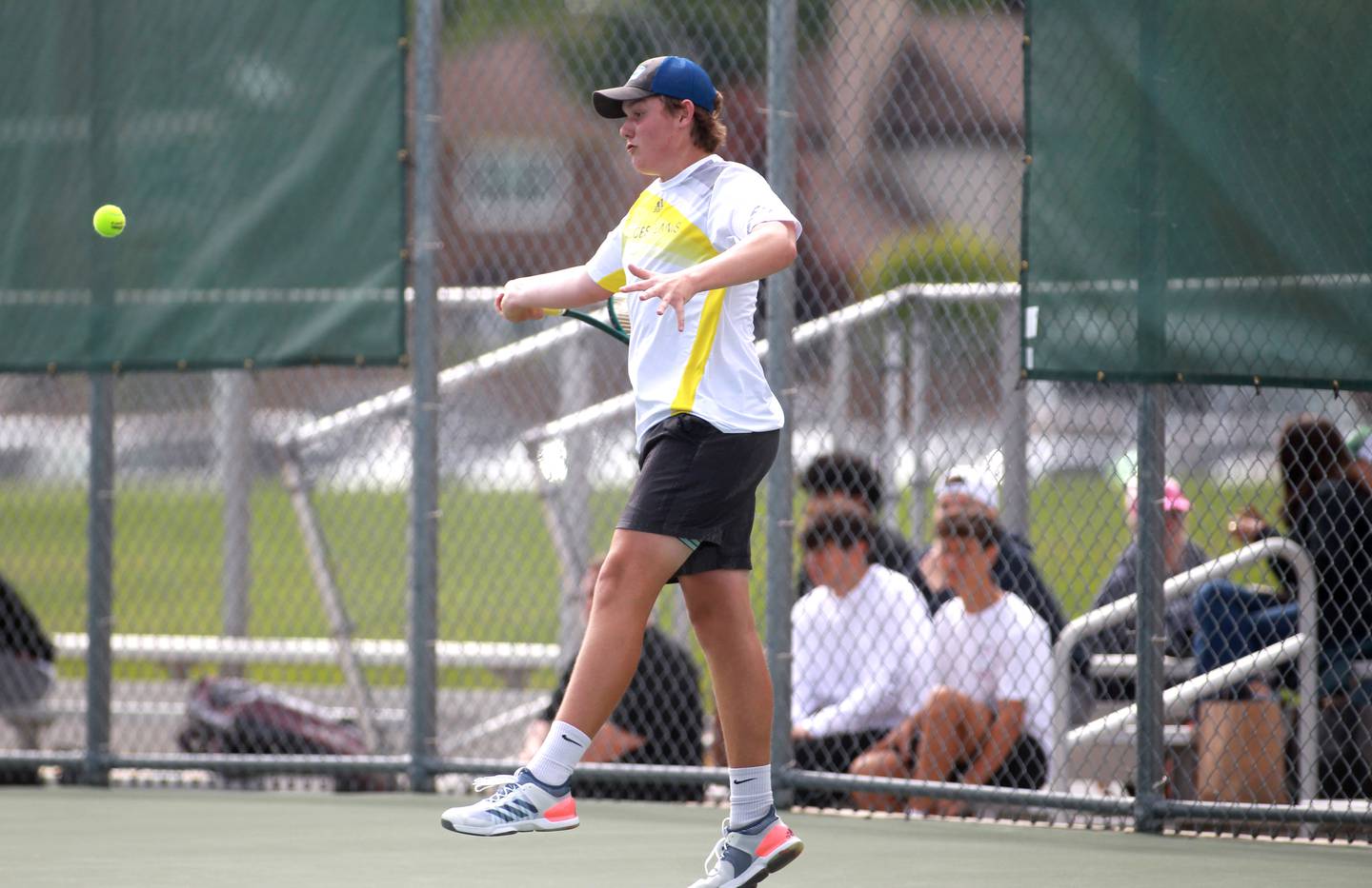 Jacobs’ Augie Nelson returns the ball during the first round of the 2A boys state tennis meet with doubles partner Jack Soto (not pictured) on Thursday, May 29. 2025 at Hersey High School.