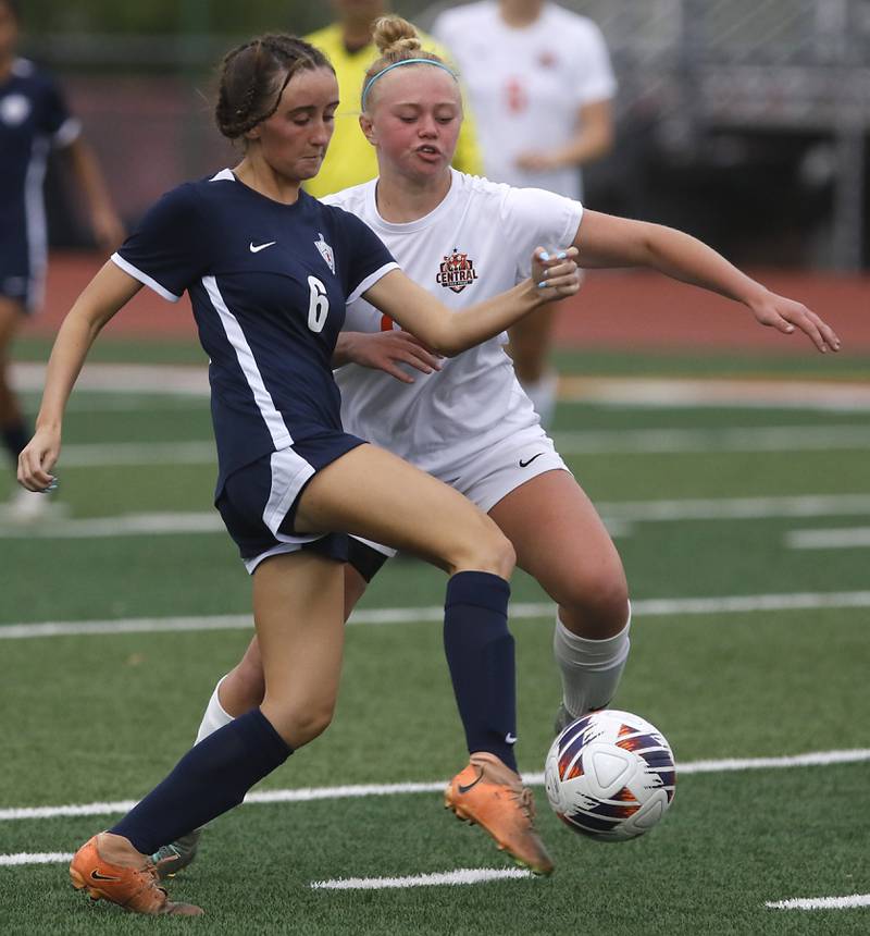 St. Viator's Ella Dean battles with Crystal Lake Central's Allison Barnett for control of the ball during the IHSA Class 2A Deerfield Sectional championship girls soccer match on Friday, May 30, 2025, at Deerfield High School.