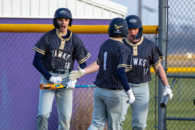 Teammates of Aaron Jindrich of Hiawatha express excitement after he scores on Monday, April 7, 2025 at Serena High School in Serena.