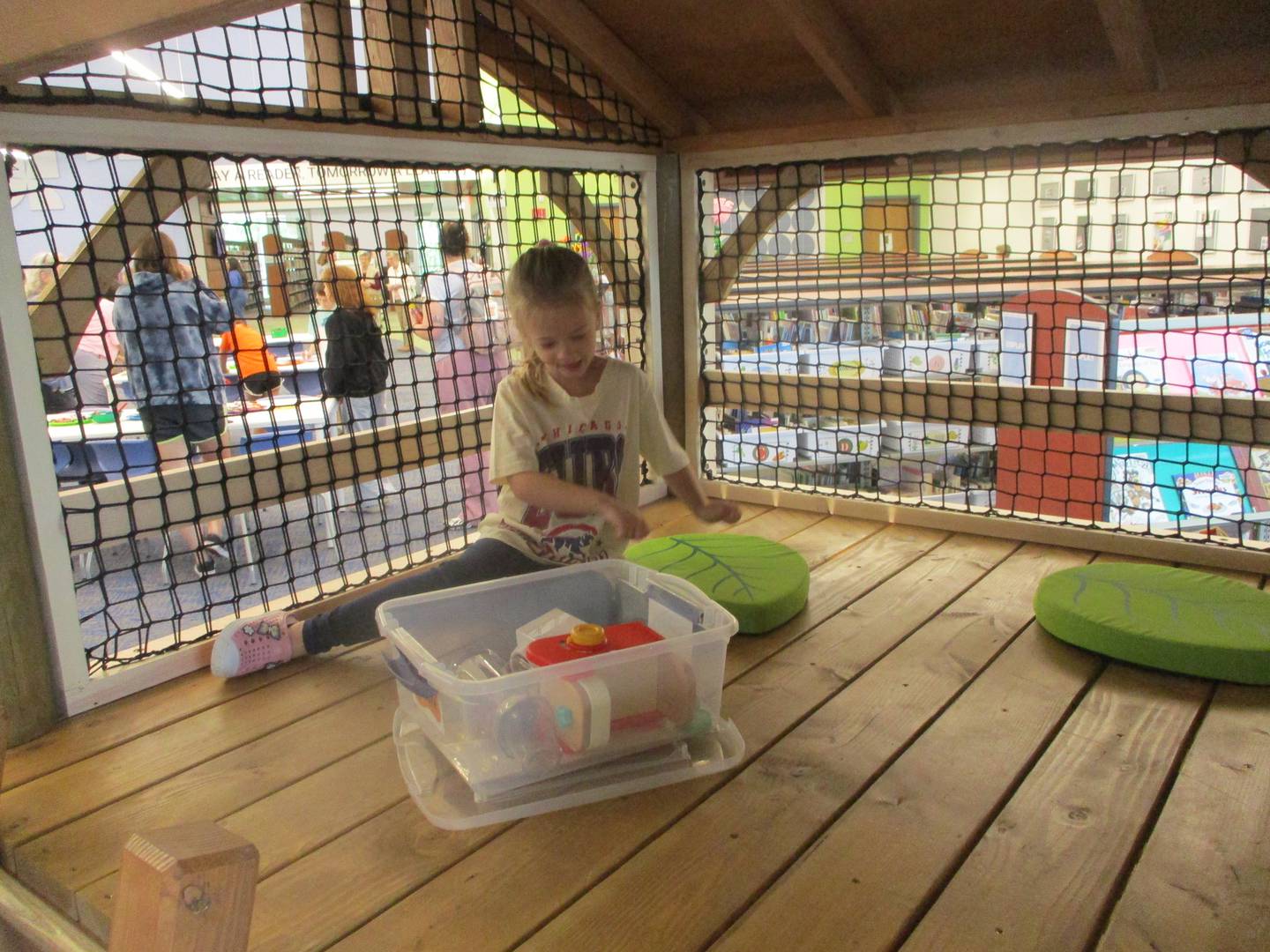 Alessia Ballone, 5, of Joliet plays inside the Book Burrow, a feature in the new Kid Zone at the Joliet Public Library Black Road Branch, which held an open house on Friday to showcase renovations. April 24, 2026