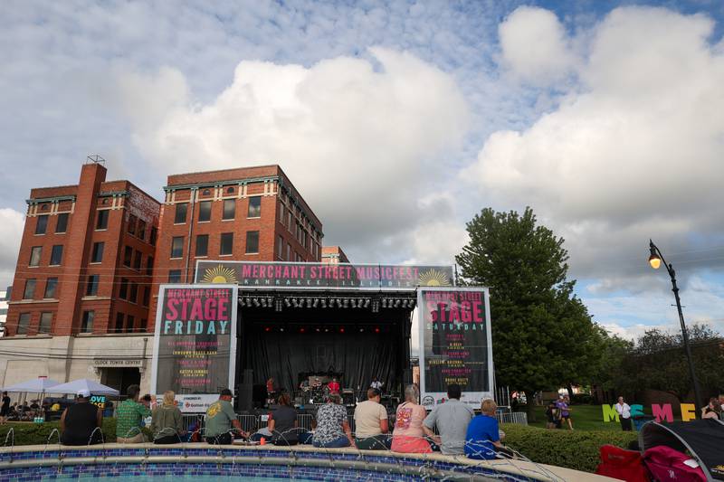 Clouds pass over the Merchant Street Stage as the Kankakee-based Katzpa Jammas perform during Merchant Street MusicFest on Friday, July 25, 2025.
