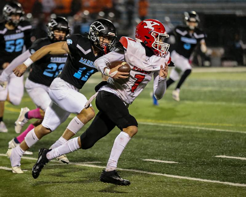 Yorkville's Dom Coronado (1) runs after a short catch during Class 7A football playoff game between Yorkville at Willowbrook.   Oct 27, 2023.