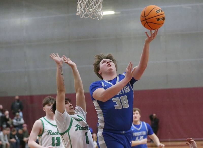 Princeton's Jordan Reinhardt lets go of a shot over Rock Falls's Austin Castaneda during the Class 2A Sectional final on Friday, March 7, 2025 at Marengo High School.
