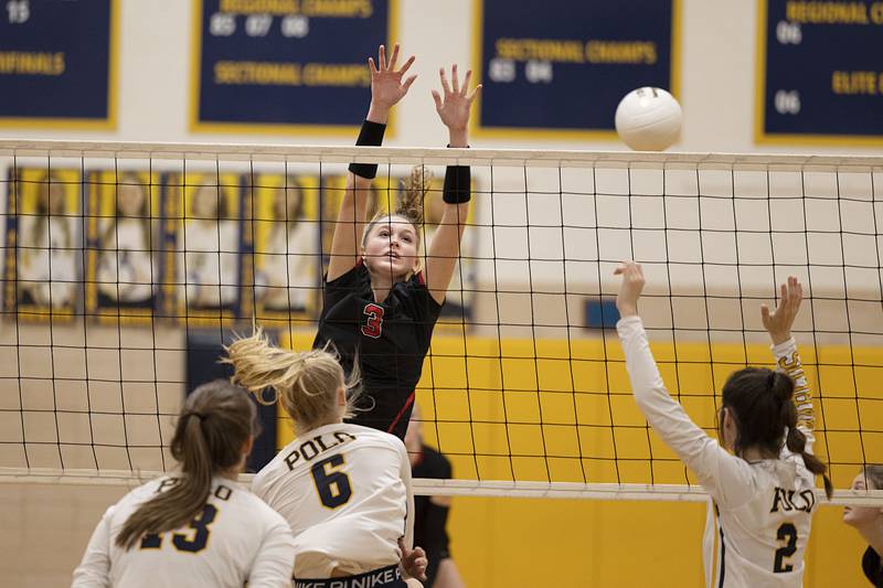 Fulton’s Annaka Hackett goes up for a block in game one of their semifinal regional match Wednesday, Oct. 26, 2022 against Polo.