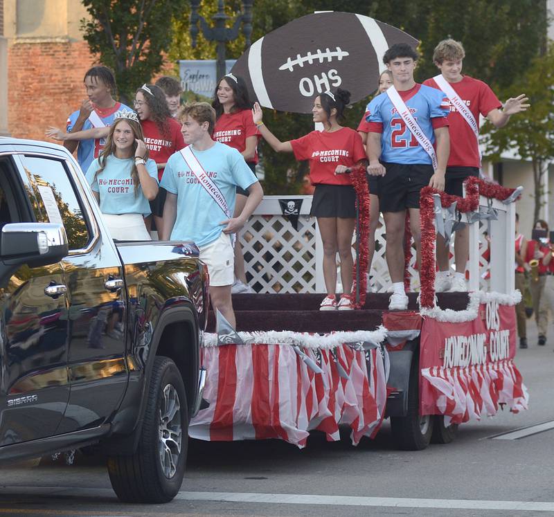 The 2024 Ottawa High Homecoming Court waves to the crowd along the Homecoming Parade route on La Salle St Wednesday evening in Ottawa.