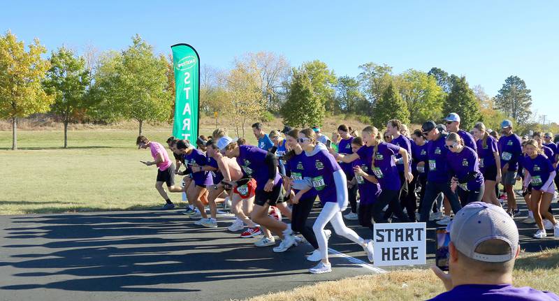Participants in the Sugar Grove Park District’s inaugural Run to Remember 5K & Fun Run take off on Saturday, Oct. 19, 2024 in Sugar Grove.