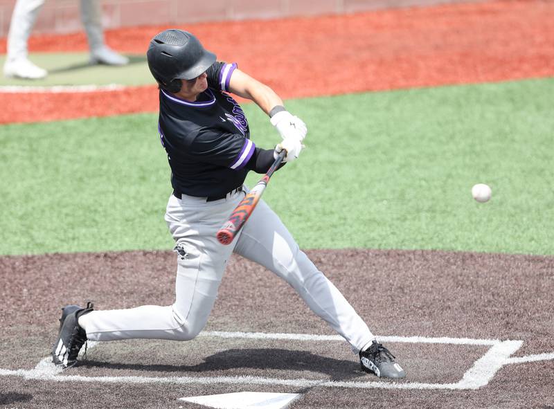 Downers Grove North's Tommy Finley (15) makes contact during the IHSA Class 4A baseball regional final between Downers Grove North and Hinsdale Central at Bolingbrook High School on Saturday, May 27, 2023.
