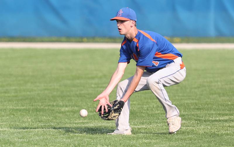 Genoa-Kingston's Connor Grimm fields a ball on a bounce during their game against Byron Tuesday, May 10, 2022, at Genoa-Kingston High School.