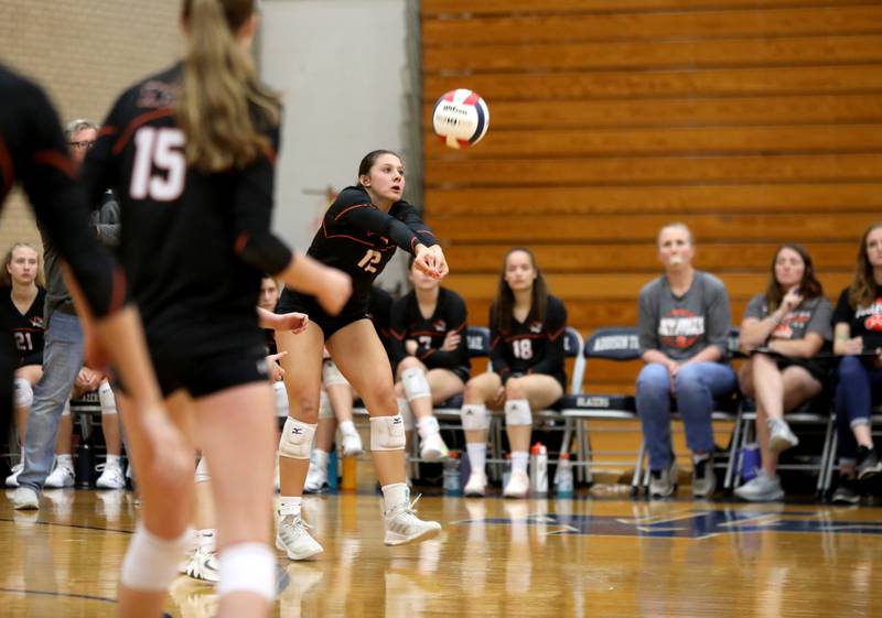 Wheaton Warrenville South’s Cate Cassin returns the ball during the Class 4A Addison Trail Regional final against Geneva on Thursday, Oct. 26, 2023.