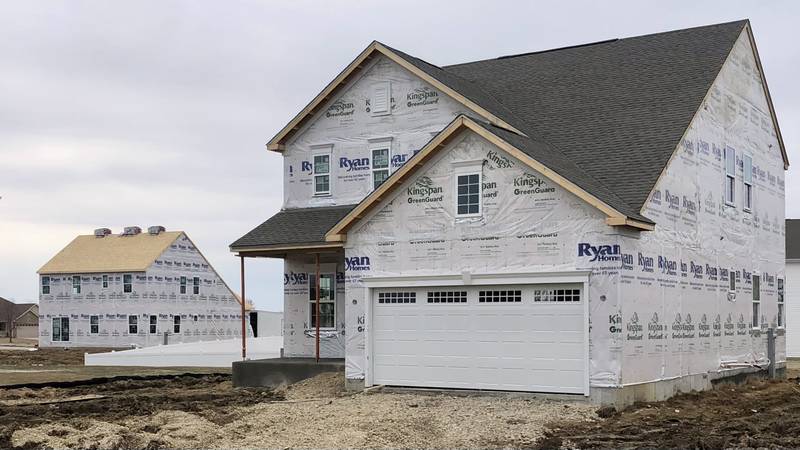 Several houses are under various stages of construction by developer Ryan Homes in the Fairwinds subdivision in Sandwich on Thursday March 16, 2023.