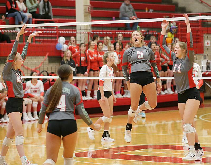 Members of the L-P volleyball team react after defeating Ottawa on Tuesday, Oct. 18, 2022 at Kingman Gymnasium in Ottawa.