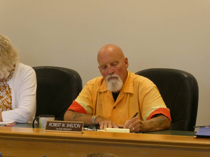 Hebron President Robert Shelton, center, appointed a new village treasurer during Monday's meeting, Aug. 22, 2022, citing past disagreements with now-former treasurer Susan Fotland.