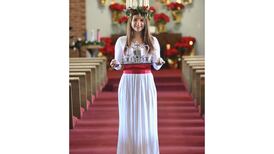 Joliet West honor student portrayed Santa Lucia in church festival