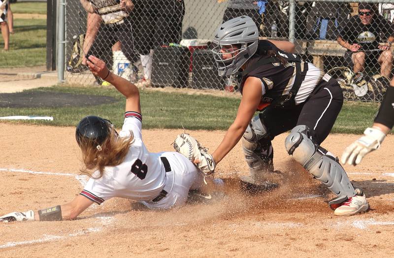 Sycamore's Kairi Lantz tags out Antioch's Miranda Gomezat home during their Class 3A supersectional game Monday, June 5, 2023, at Kaneland High School in Maple Park.