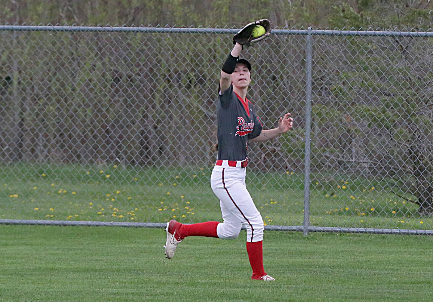 Ottawa's Makenna Chiaventone (6) makes a catch on the run in center field against L-P on Monday, May 2, 2022, at Veteran's Park in Peru.