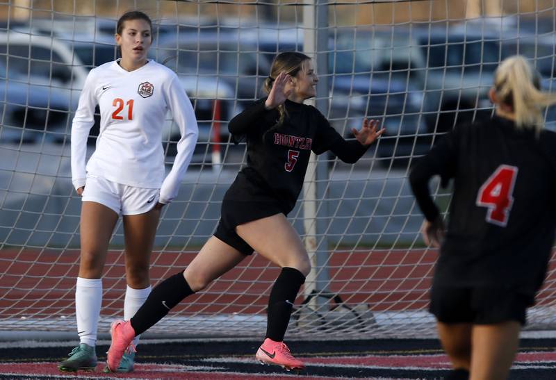 Huntley's Maizie Nickle celebrates her game winning goal in front of Crystal Lake Central's Kira Stavropoulos during a Fox Valley Conference  soccer match on Tuesday, April 15, 2025, at Huntley High School.